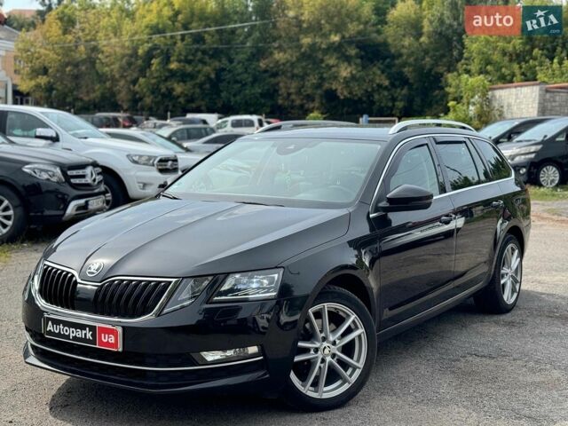 Черный Шкода Октавия, объемом двигателя 2 л и пробегом 223 тыс. км за 15390 $, фото 1 на Automoto.ua