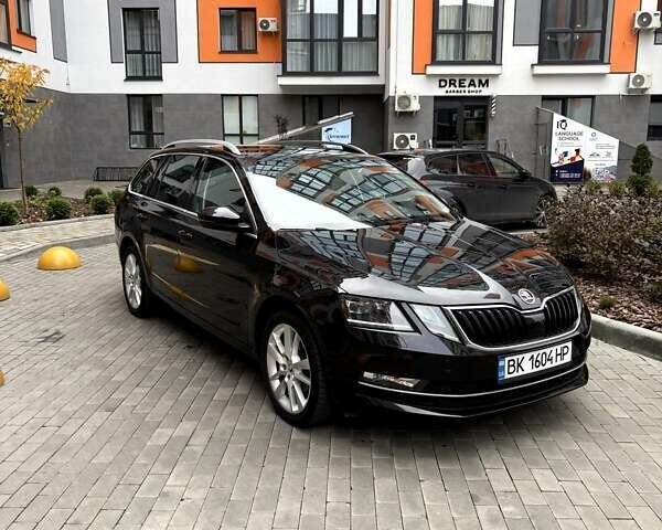 Чорний Шкода Октавія, об'ємом двигуна 1.6 л та пробігом 212 тис. км за 14200 $, фото 1 на Automoto.ua