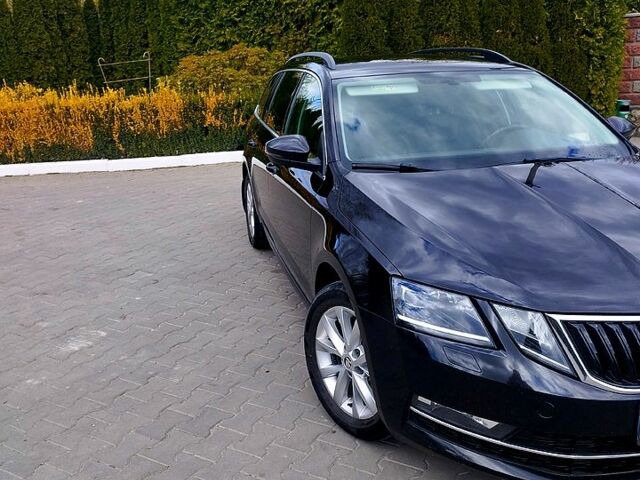 Чорний Шкода Октавія, об'ємом двигуна 2 л та пробігом 245 тис. км за 14850 $, фото 1 на Automoto.ua