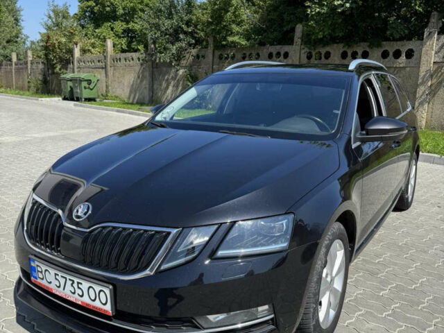 Чорний Шкода Октавія, об'ємом двигуна 2 л та пробігом 243 тис. км за 15300 $, фото 1 на Automoto.ua