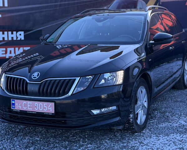 Черный Шкода Октавия, объемом двигателя 2 л и пробегом 265 тыс. км за 14400 $, фото 1 на Automoto.ua