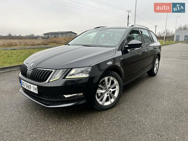 Черный Шкода Октавия, объемом двигателя 1.6 л и пробегом 230 тыс. км за 12700 $, фото 1 на Automoto.ua