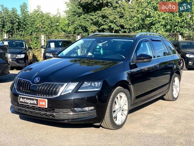 Черный Шкода Октавия, объемом двигателя 2 л и пробегом 223 тыс. км за 15490 $, фото 1 на Automoto.ua