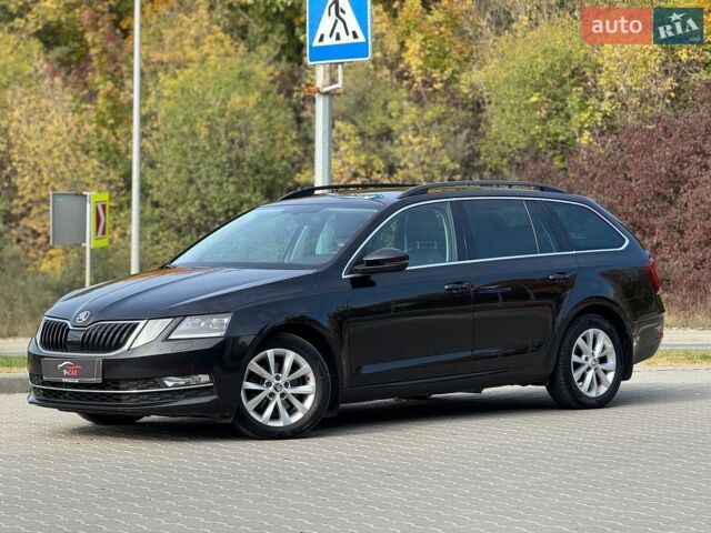 Черный Шкода Октавия, объемом двигателя 2 л и пробегом 245 тыс. км за 14999 $, фото 1 на Automoto.ua