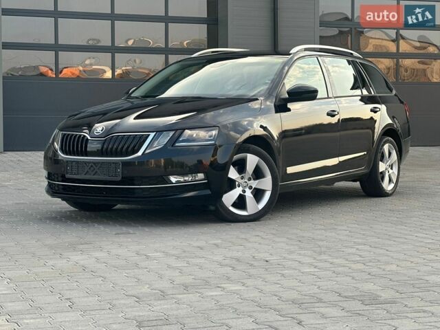 Черный Шкода Октавия, объемом двигателя 2 л и пробегом 235 тыс. км за 14200 $, фото 1 на Automoto.ua