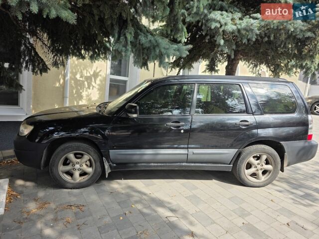 Черный Шкода Октавия, объемом двигателя 2 л и пробегом 262 тыс. км за 14999 $, фото 1 на Automoto.ua