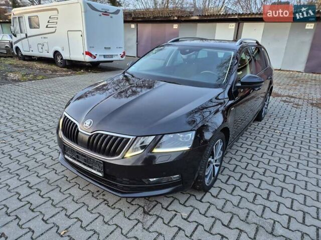 Черный Шкода Октавия, объемом двигателя 2 л и пробегом 235 тыс. км за 15400 $, фото 1 на Automoto.ua