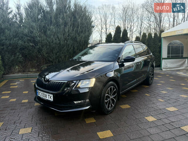 Черный Шкода Октавия, объемом двигателя 1.6 л и пробегом 259 тыс. км за 13850 $, фото 1 на Automoto.ua