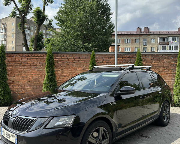 Черный Шкода Октавия, объемом двигателя 2 л и пробегом 255 тыс. км за 13999 $, фото 1 на Automoto.ua