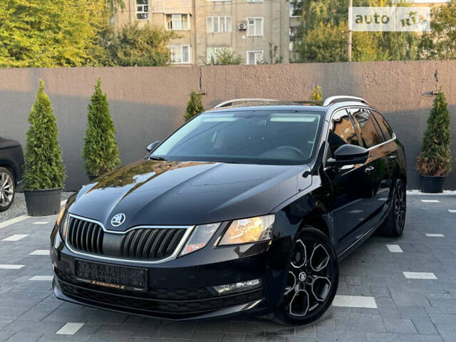 Черный Шкода Октавия, объемом двигателя 1.6 л и пробегом 220 тыс. км за 13990 $, фото 1 на Automoto.ua