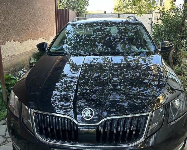 Черный Шкода Октавия, объемом двигателя 1.6 л и пробегом 201 тыс. км за 17000 $, фото 1 на Automoto.ua