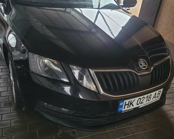 Черный Шкода Октавия, объемом двигателя 1.6 л и пробегом 243 тыс. км за 14000 $, фото 1 на Automoto.ua