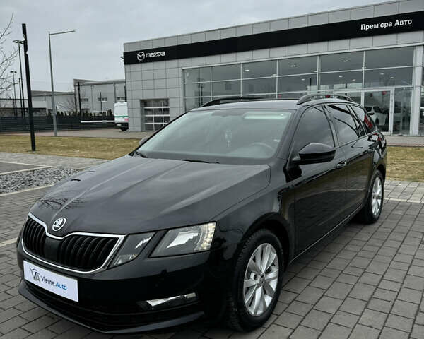 Черный Шкода Октавия, объемом двигателя 1.6 л и пробегом 218 тыс. км за 13999 $, фото 1 на Automoto.ua