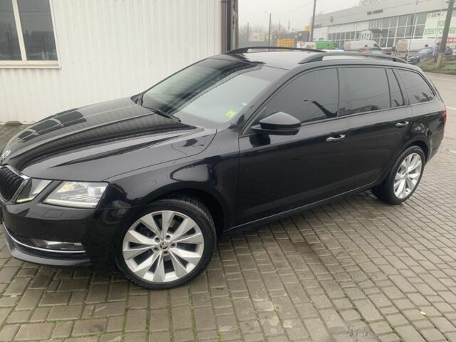 Черный Шкода Октавия, объемом двигателя 2 л и пробегом 259 тыс. км за 14500 $, фото 1 на Automoto.ua