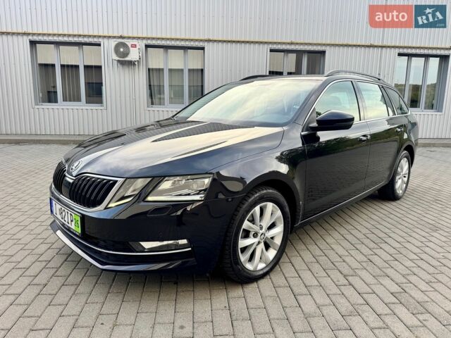 Черный Шкода Октавия, объемом двигателя 2 л и пробегом 220 тыс. км за 14600 $, фото 1 на Automoto.ua