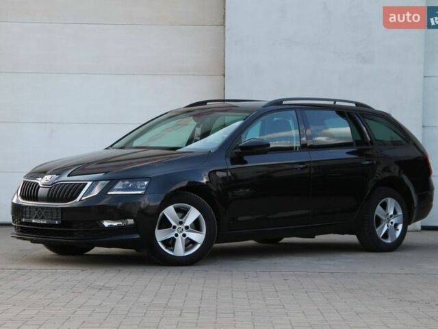 Черный Шкода Октавия, объемом двигателя 2 л и пробегом 217 тыс. км за 14300 $, фото 1 на Automoto.ua