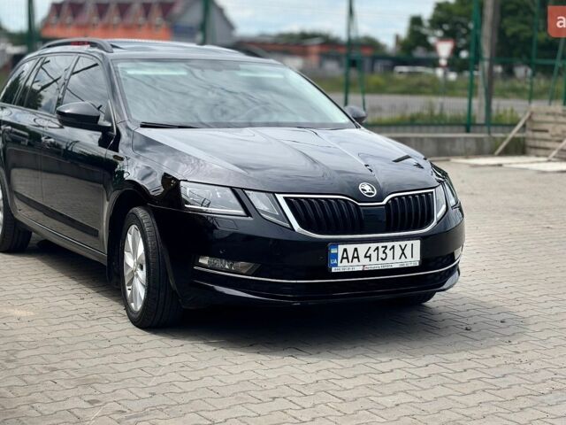 Чорний Шкода Октавія, об'ємом двигуна 1.8 л та пробігом 239 тис. км за 14499 $, фото 1 на Automoto.ua