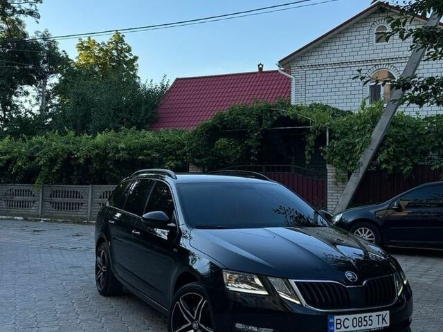 Черный Шкода Октавия, объемом двигателя 2 л и пробегом 254 тыс. км за 16400 $, фото 1 на Automoto.ua