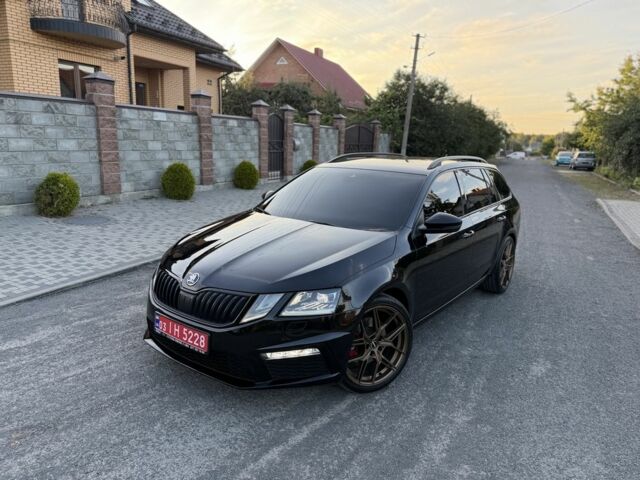 Черный Шкода Октавия, объемом двигателя 2 л и пробегом 218 тыс. км за 20486 $, фото 1 на Automoto.ua