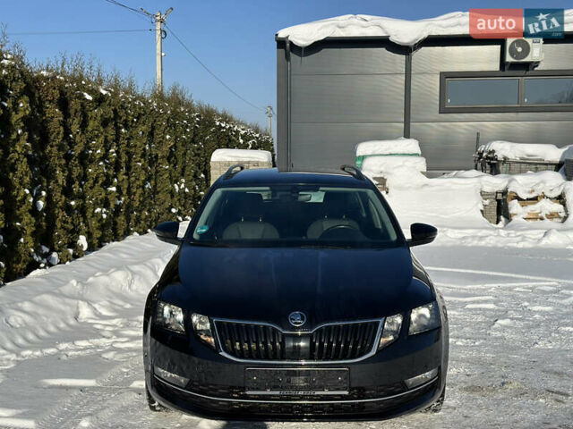 Черный Шкода Октавия, объемом двигателя 2 л и пробегом 217 тыс. км за 14600 $, фото 1 на Automoto.ua
