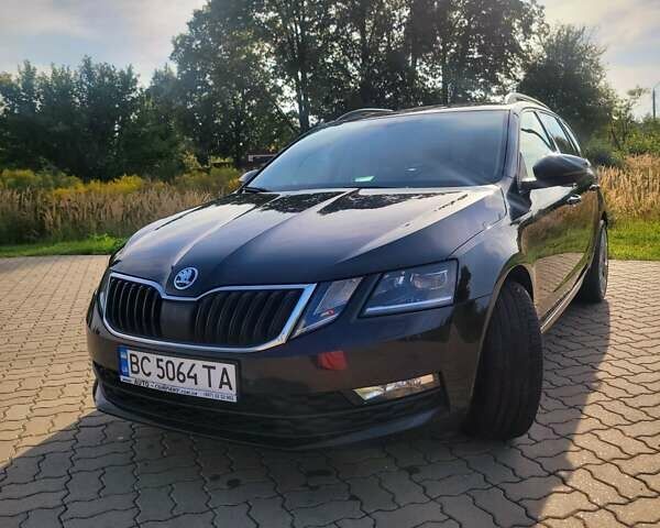 Черный Шкода Октавия, объемом двигателя 2 л и пробегом 216 тыс. км за 19500 $, фото 1 на Automoto.ua