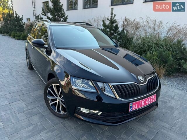 Чорний Шкода Октавія, об'ємом двигуна 2 л та пробігом 207 тис. км за 18500 $, фото 1 на Automoto.ua