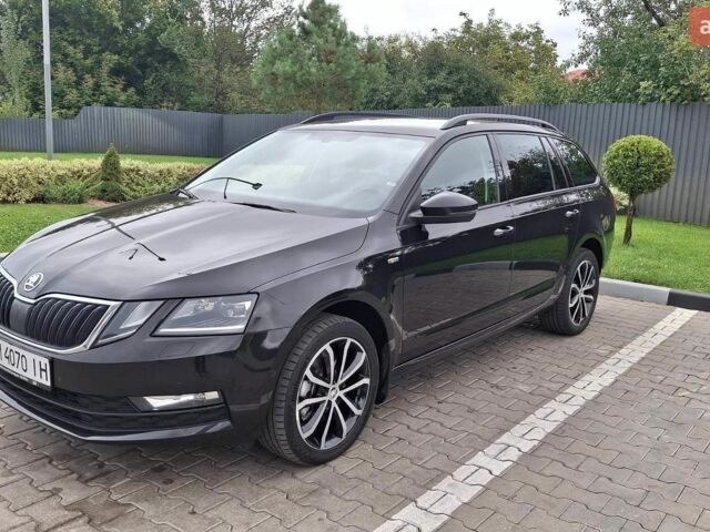 Черный Шкода Октавия, объемом двигателя 2 л и пробегом 220 тыс. км за 16990 $, фото 1 на Automoto.ua