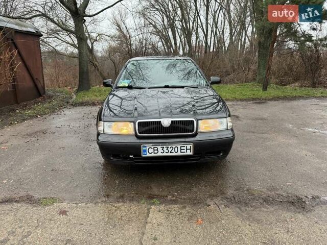 Черный Шкода Октавия, объемом двигателя 1.6 л и пробегом 235 тыс. км за 3450 $, фото 1 на Automoto.ua