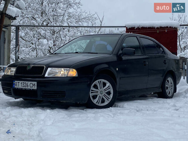 Черный Шкода Октавия, объемом двигателя 1.6 л и пробегом 250 тыс. км за 1850 $, фото 1 на Automoto.ua