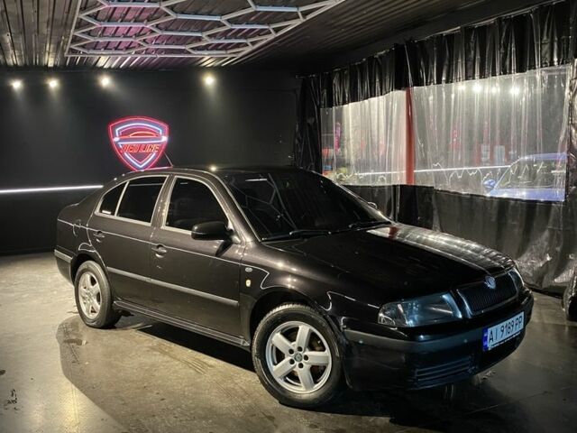 Черный Шкода Октавия, объемом двигателя 2 л и пробегом 401 тыс. км за 4400 $, фото 1 на Automoto.ua