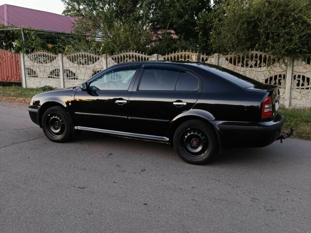 Черный Шкода Октавия, объемом двигателя 2 л и пробегом 320 тыс. км за 3450 $, фото 1 на Automoto.ua