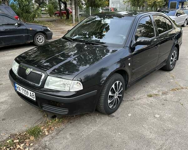 Черный Шкода Октавия, объемом двигателя 1.6 л и пробегом 192 тыс. км за 4100 $, фото 1 на Automoto.ua