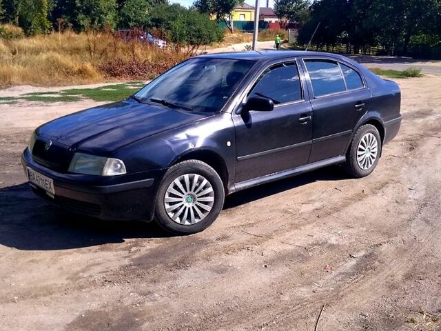 Черный Шкода Октавия, объемом двигателя 2 л и пробегом 400 тыс. км за 3850 $, фото 1 на Automoto.ua