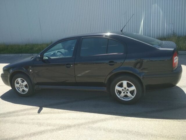 Черный Шкода Октавия, объемом двигателя 2 л и пробегом 212 тыс. км за 4600 $, фото 1 на Automoto.ua