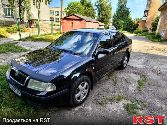 Черный Шкода Октавия, объемом двигателя 1.8 л и пробегом 399 тыс. км за 5200 $, фото 1 на Automoto.ua