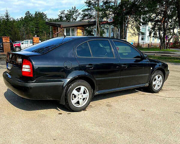 Чорний Шкода Октавія, об'ємом двигуна 1.8 л та пробігом 380 тис. км за 5500 $, фото 1 на Automoto.ua