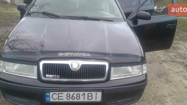 Черный Шкода Октавия, объемом двигателя 1.6 л и пробегом 278 тыс. км за 3800 $, фото 1 на Automoto.ua