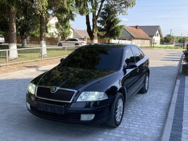 Черный Шкода Октавия, объемом двигателя 1.6 л и пробегом 251 тыс. км за 5700 $, фото 1 на Automoto.ua