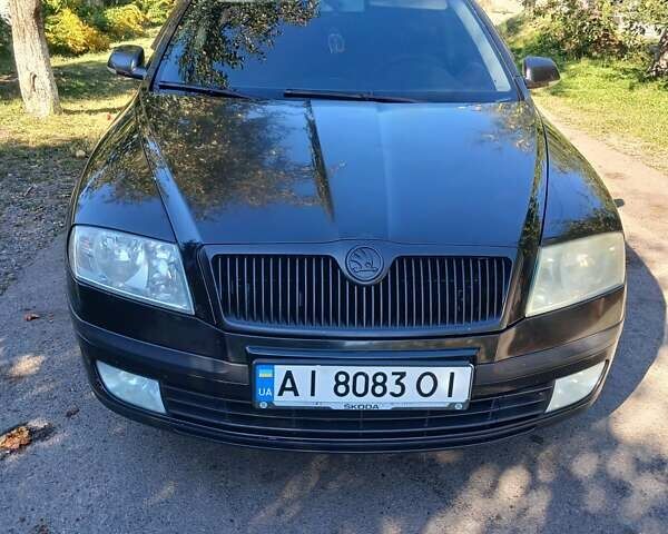 Черный Шкода Октавия, объемом двигателя 1.6 л и пробегом 288 тыс. км за 4700 $, фото 1 на Automoto.ua