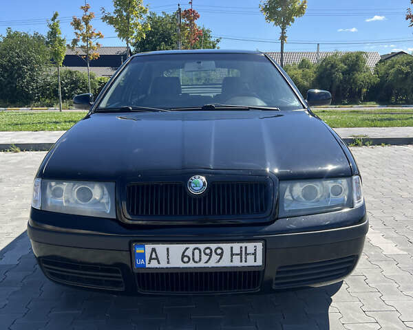 Чорний Шкода Октавія, об'ємом двигуна 1.8 л та пробігом 291 тис. км за 5300 $, фото 1 на Automoto.ua