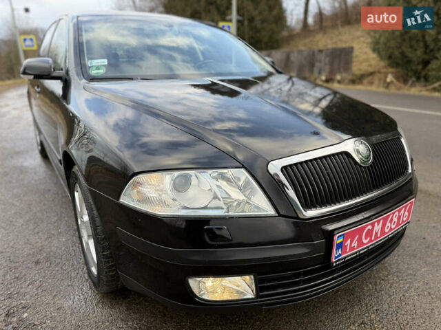 Черный Шкода Октавия, объемом двигателя 1.6 л и пробегом 210 тыс. км за 5450 $, фото 1 на Automoto.ua