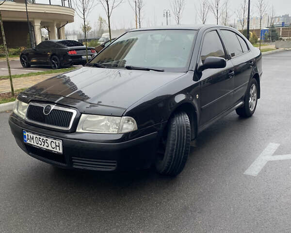 Черный Шкода Октавия, объемом двигателя 1.6 л и пробегом 359 тыс. км за 5100 $, фото 1 на Automoto.ua