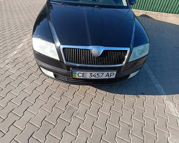 Черный Шкода Октавия, объемом двигателя 2 л и пробегом 248 тыс. км за 5700 $, фото 1 на Automoto.ua