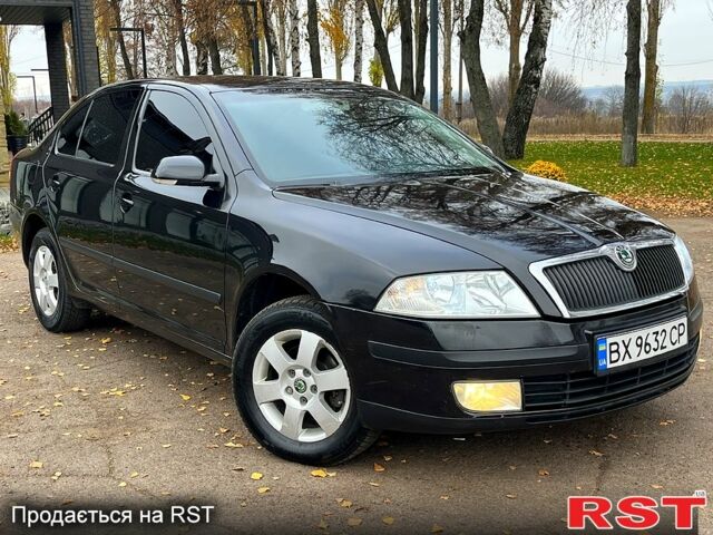 Черный Шкода Октавия, объемом двигателя 1.6 л и пробегом 256 тыс. км за 5800 $, фото 1 на Automoto.ua