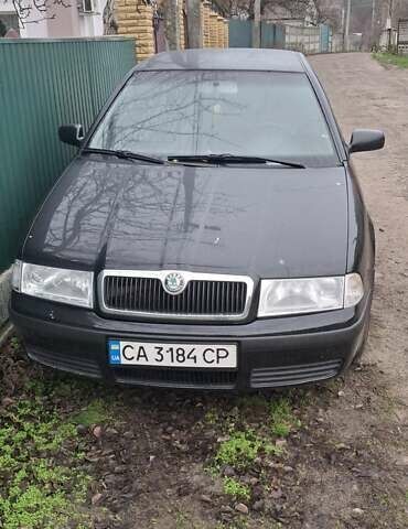 Черный Шкода Октавия, объемом двигателя 1.6 л и пробегом 292 тыс. км за 4500 $, фото 1 на Automoto.ua