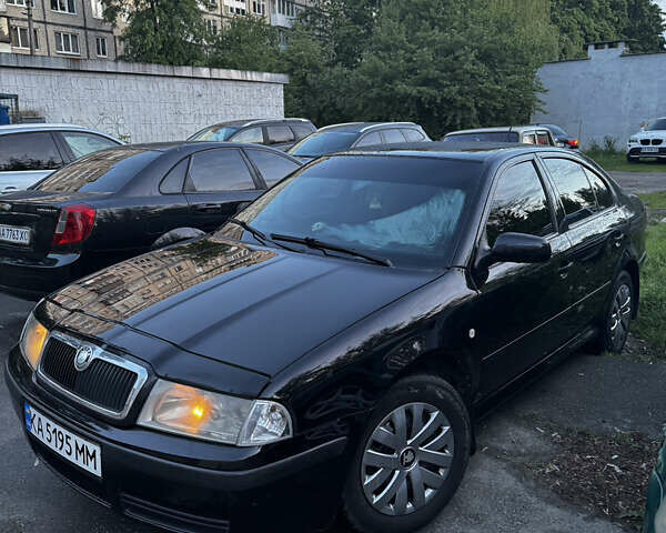 Черный Шкода Октавия, объемом двигателя 1.6 л и пробегом 250 тыс. км за 5200 $, фото 1 на Automoto.ua