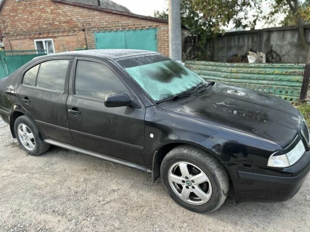 Черный Шкода Октавия, объемом двигателя 1.6 л и пробегом 210 тыс. км за 5200 $, фото 1 на Automoto.ua