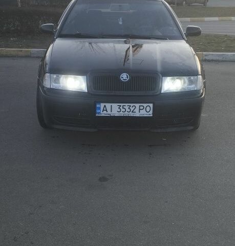 Черный Шкода Октавия, объемом двигателя 1.8 л и пробегом 270 тыс. км за 5400 $, фото 1 на Automoto.ua