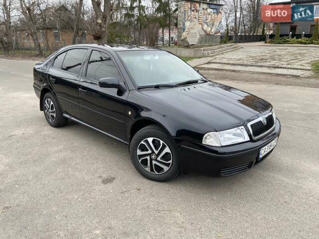 Черный Шкода Октавия, объемом двигателя 1.6 л и пробегом 292 тыс. км за 5250 $, фото 1 на Automoto.ua