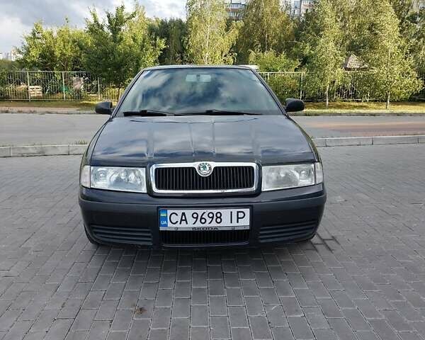 Черный Шкода Октавия, объемом двигателя 1.6 л и пробегом 285 тыс. км за 5300 $, фото 1 на Automoto.ua